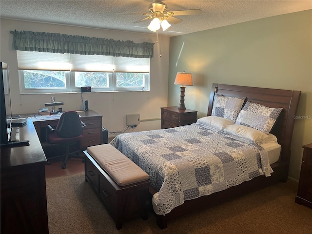 bedroom with ceiling fan and a textured ceiling