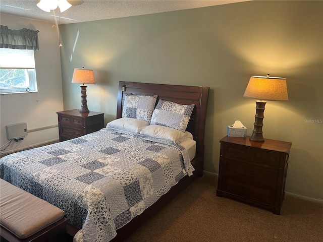 carpeted bedroom with a textured ceiling