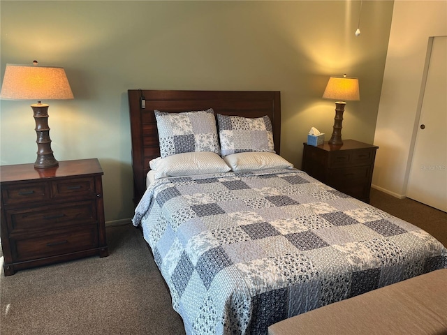 bedroom with dark carpet