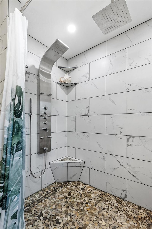 bathroom featuring curtained shower