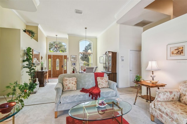 living room featuring crown molding, light colored carpet, and a towering ceiling