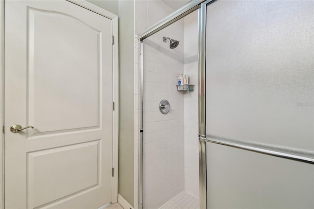 bathroom with an enclosed shower