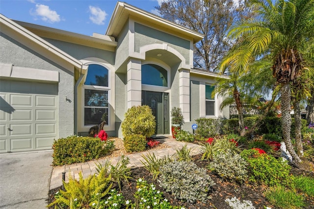 doorway to property featuring a garage