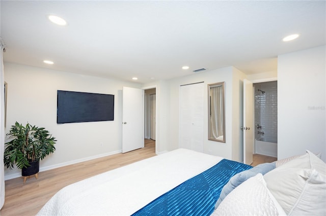 bedroom with a closet and light wood-type flooring