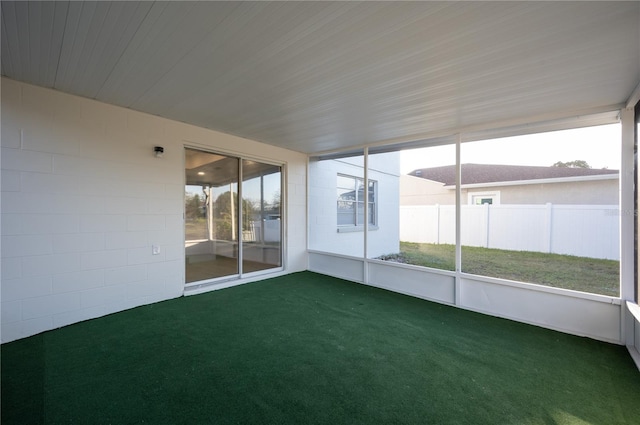 unfurnished sunroom with a wealth of natural light