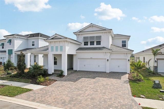 view of front of property with a garage