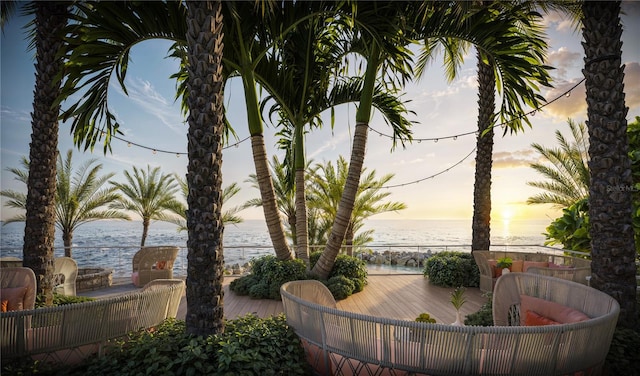 patio terrace at dusk with a water view