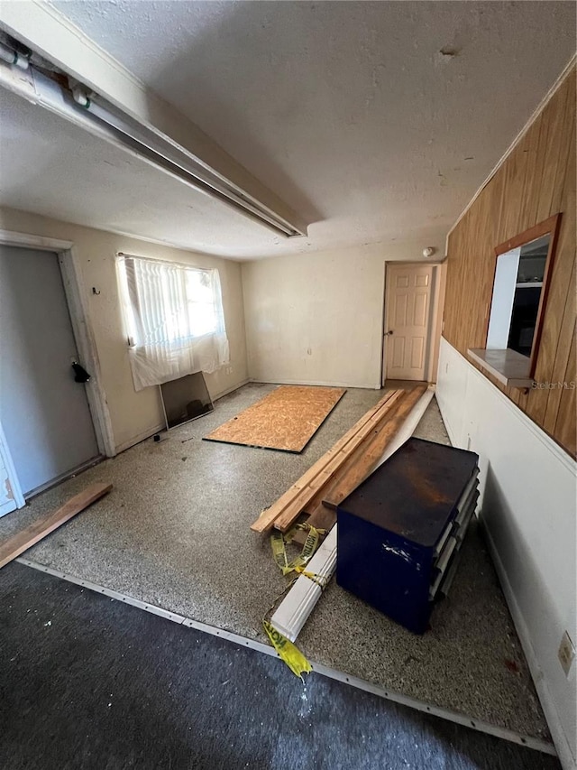 interior space featuring a textured ceiling