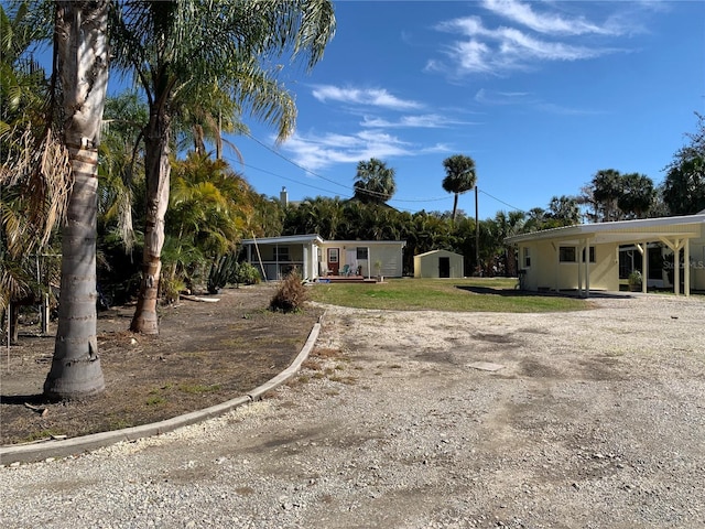 exterior space with a storage shed