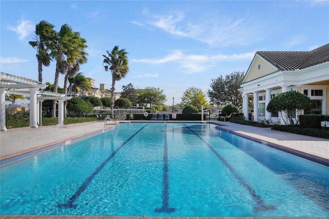 view of pool featuring a patio area and a pergola