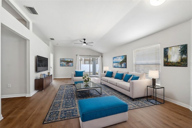 living room with wood-type flooring, lofted ceiling, and ceiling fan