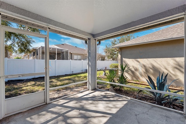 unfurnished sunroom with a healthy amount of sunlight