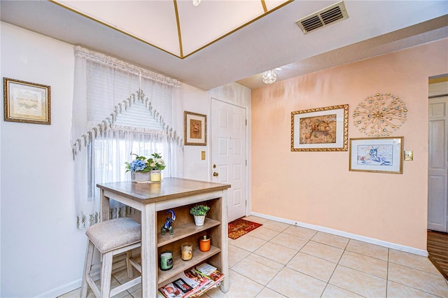 dining room featuring light tile patterned floors