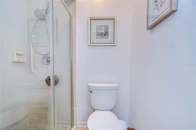 bathroom with walk in shower and toilet