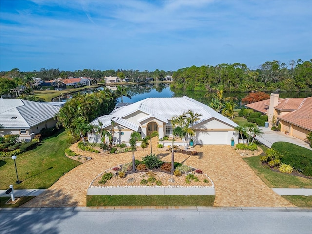 drone / aerial view with a water view