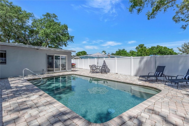 view of pool with a patio area