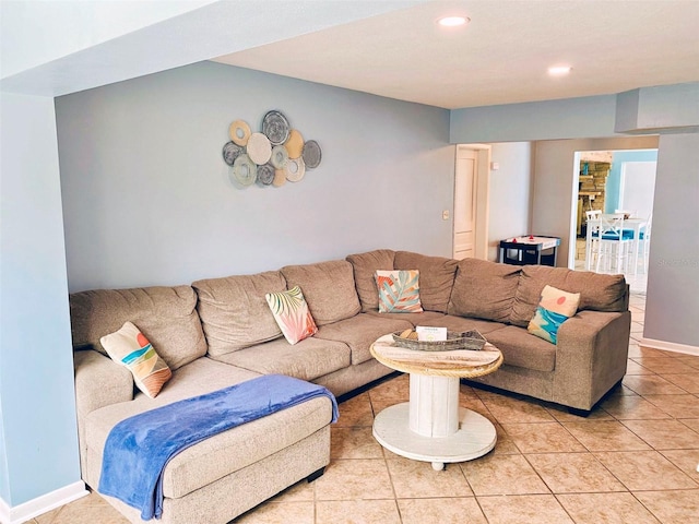 living room with tile patterned flooring