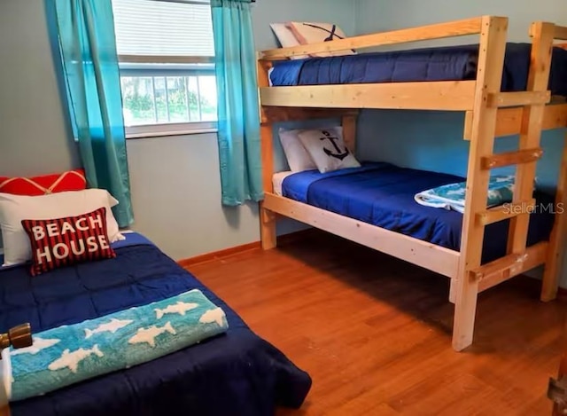 bedroom featuring wood-type flooring