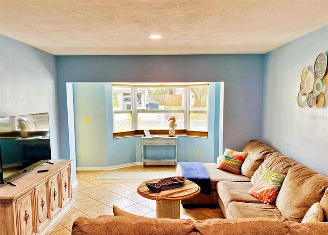 tiled living room with a textured ceiling