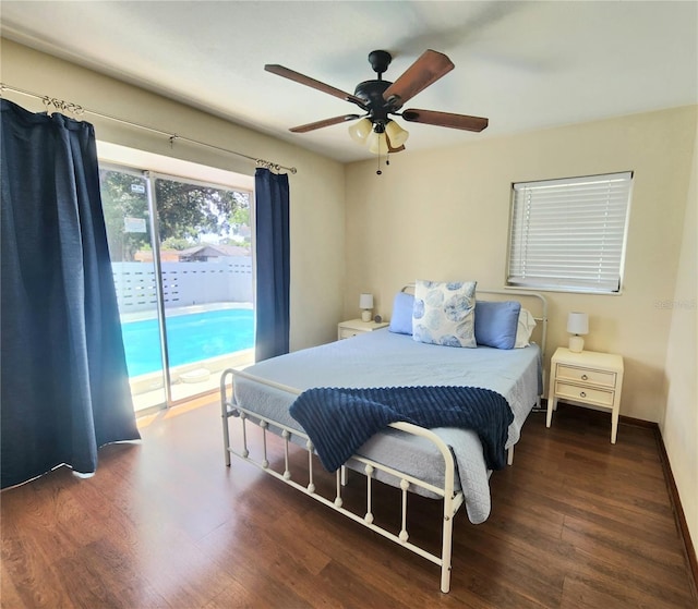 bedroom featuring access to exterior, ceiling fan, wood finished floors, and baseboards