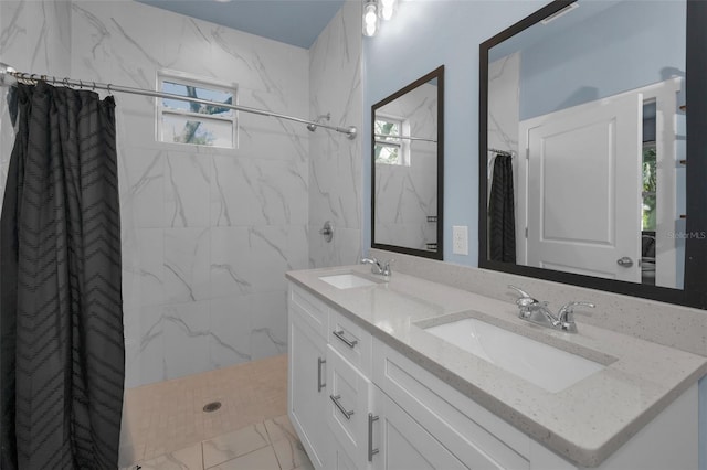 bathroom featuring vanity and walk in shower