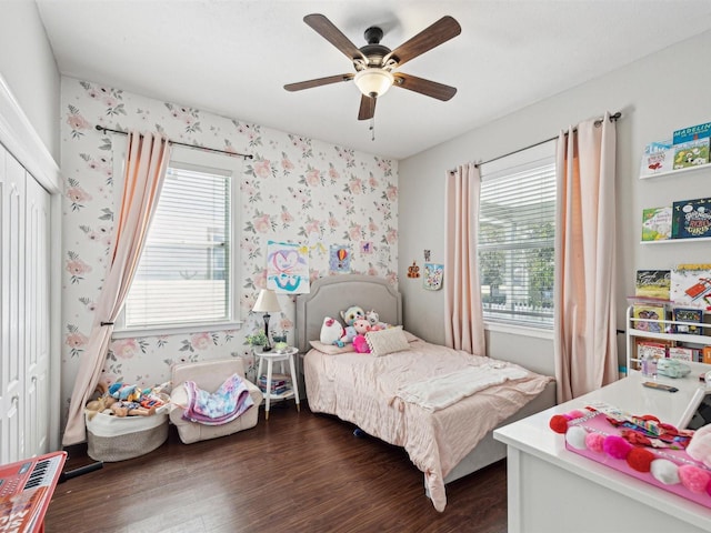 bedroom featuring ceiling fan and dark wood-type flooring