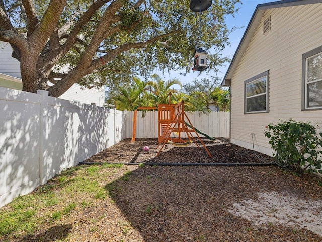 view of yard with a playground