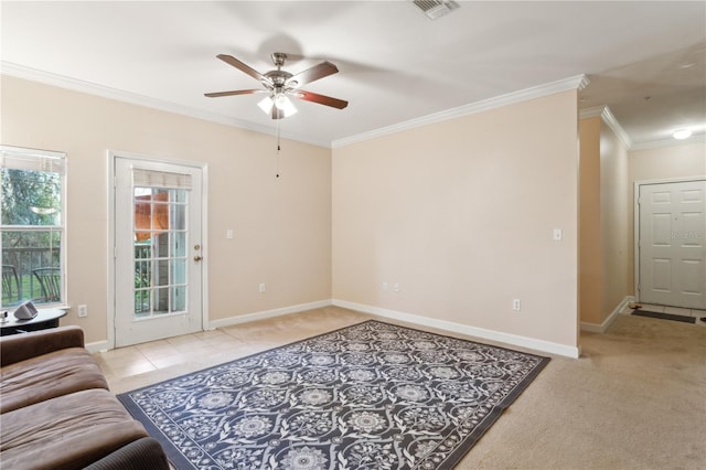 living room with light carpet, crown molding, and ceiling fan