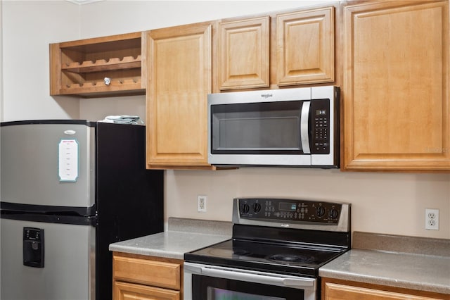 kitchen with appliances with stainless steel finishes