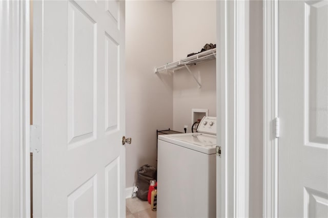 washroom featuring washer and clothes dryer