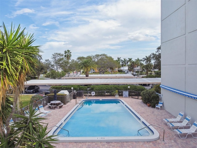 view of pool featuring a patio