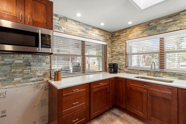 kitchen with sink and light wood-type flooring