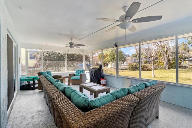 sunroom / solarium with ceiling fan and a healthy amount of sunlight