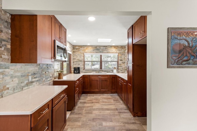 kitchen with tasteful backsplash and sink