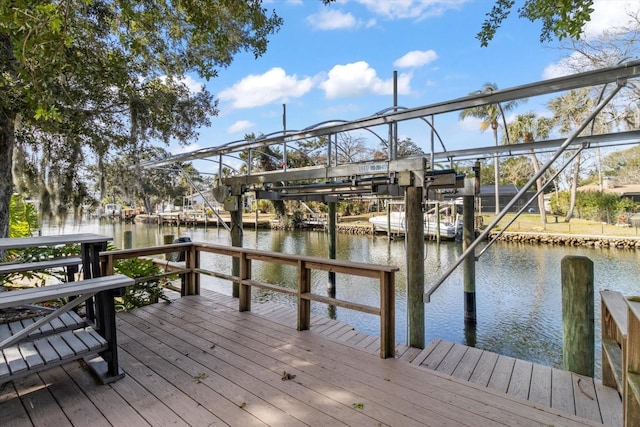 view of dock with a water view