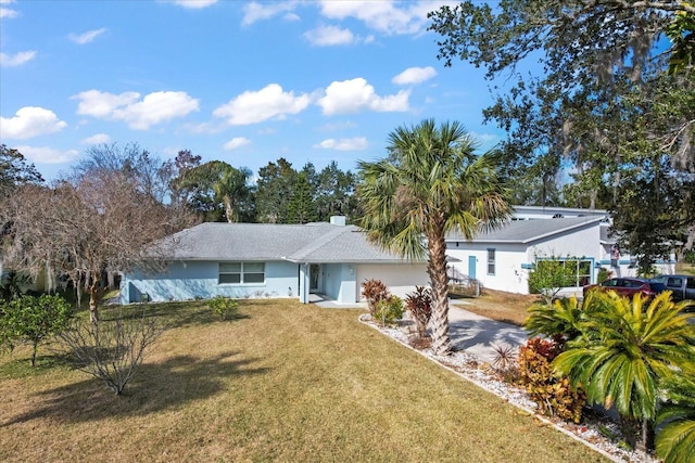 ranch-style house with a front lawn