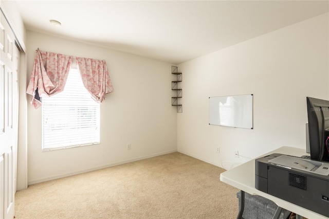 unfurnished office with light colored carpet