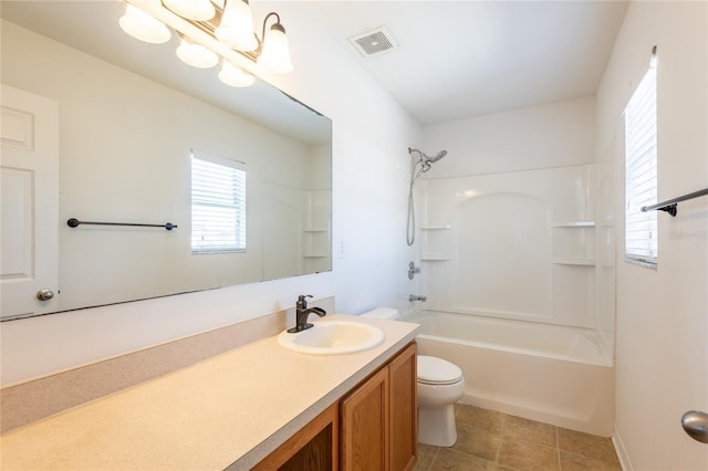 full bathroom with tile patterned flooring, vanity, a notable chandelier,  shower combination, and toilet