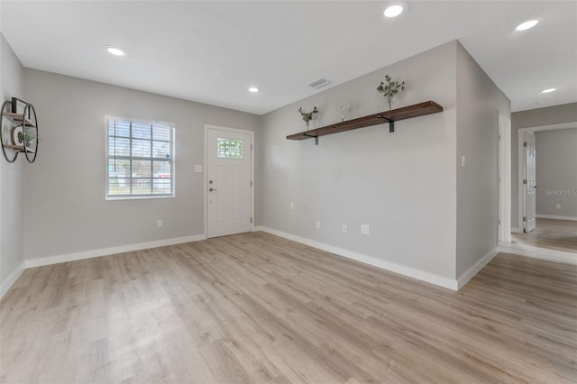 foyer with light hardwood / wood-style flooring