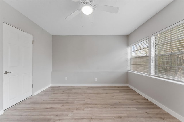 unfurnished room with light hardwood / wood-style flooring and ceiling fan