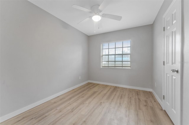 spare room with ceiling fan and light hardwood / wood-style flooring