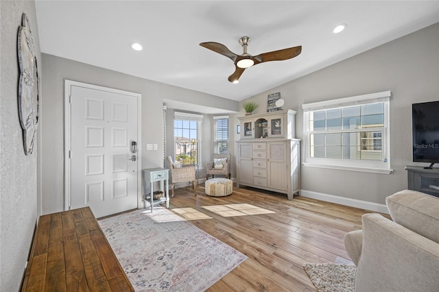 entryway featuring ceiling fan and light hardwood / wood-style floors