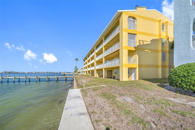 view of building exterior with a water view