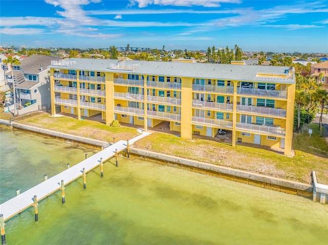 view of building exterior with a water view