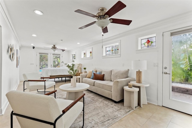 living room with light tile patterned floors, a wealth of natural light, ornamental molding, and ceiling fan