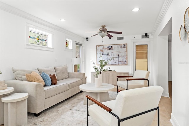 living room with ornamental molding, visible vents, and recessed lighting