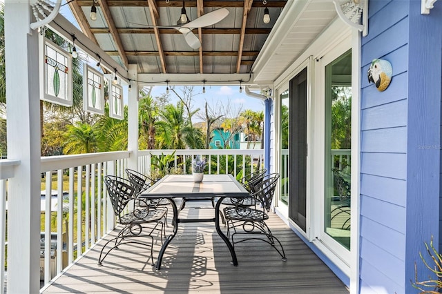 balcony featuring a sunroom