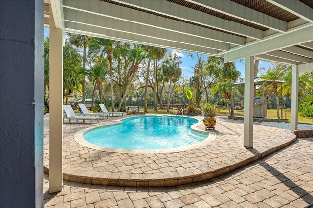 pool with a patio