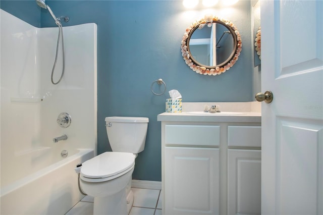 bathroom with tile patterned flooring, toilet, vanity, baseboards, and  shower combination