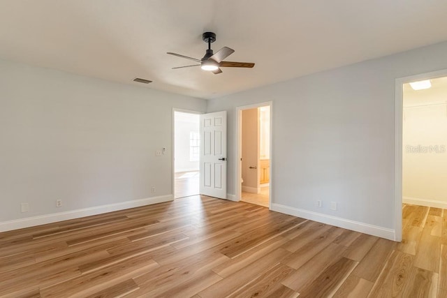 unfurnished room with light hardwood / wood-style floors and ceiling fan